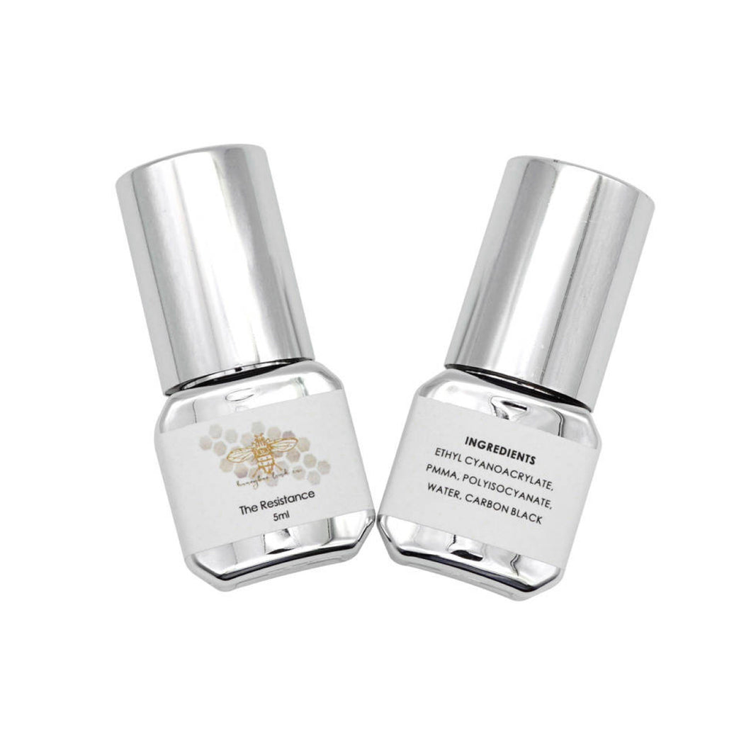 Oil and water resistant eyelash lash adhesive